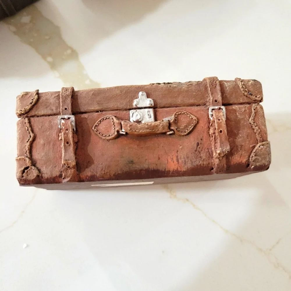 3 miniature resin suitcases